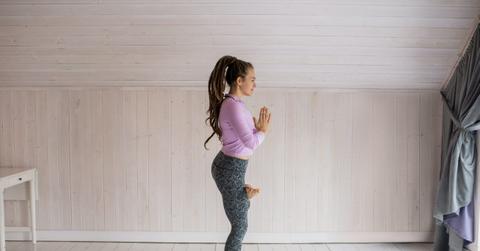 wp content/uploads///woman practicing yoga scaled