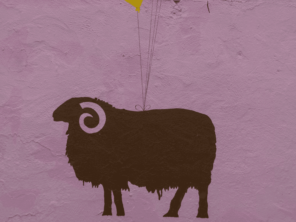 wall painting of a ram with birthday balloons