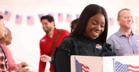 imgi_26_mid-adult-african-descent-woman-votes-in-usa-election