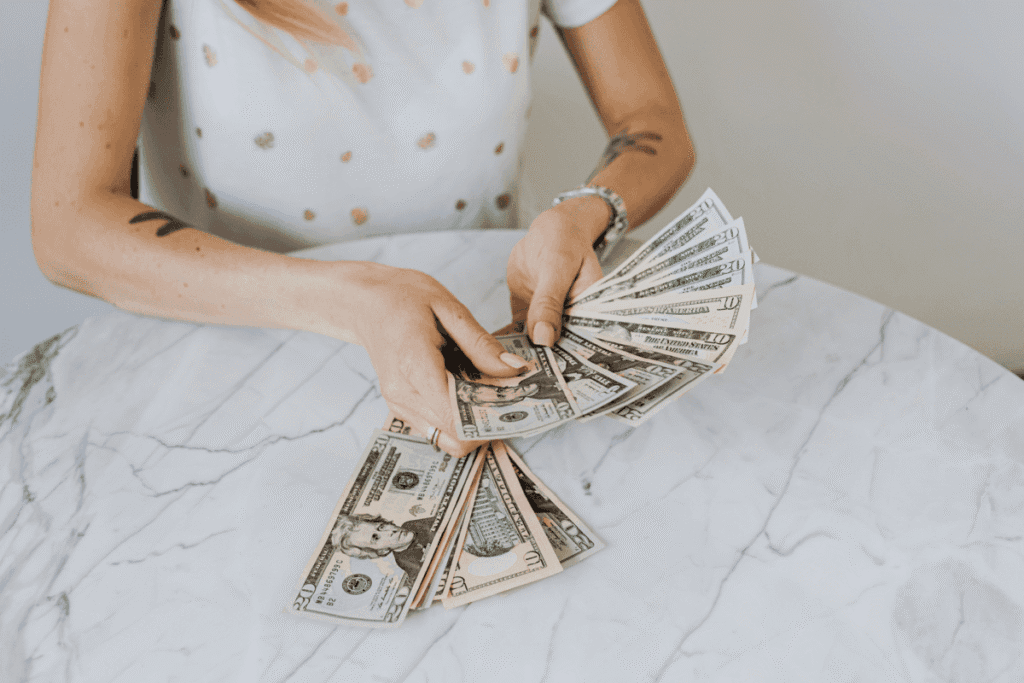 woman spending money on student loans