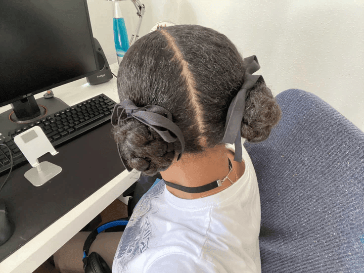 ///braided space buns on black girl