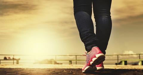 close up of feet in tennis shoes, walking