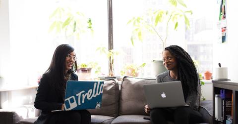 two women on laptops