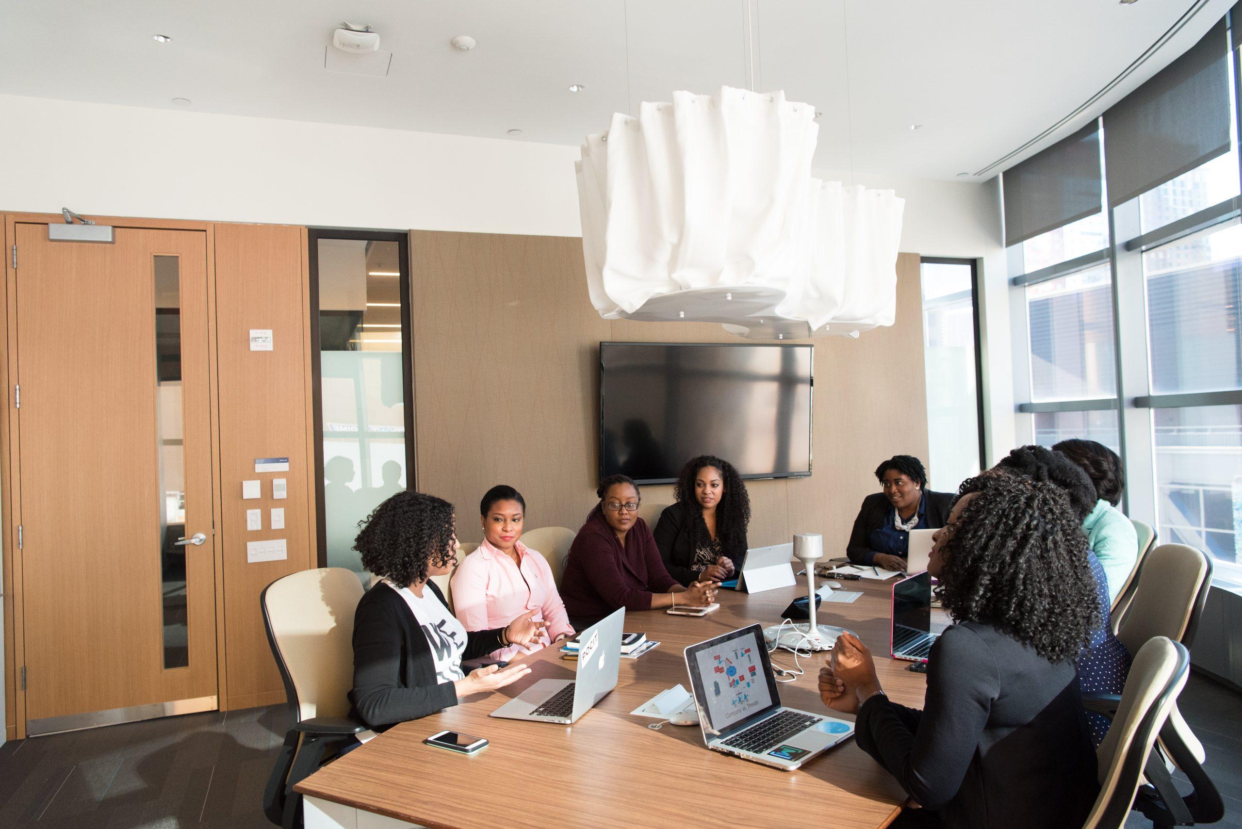 women in a meeting together